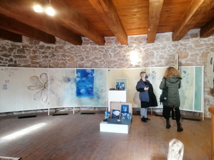 Fragmentum Exhibition Art Installation Blue International Biennale Brasov 2021 guided tour the artists in front of the Parchment Wall displayed in the White Tour