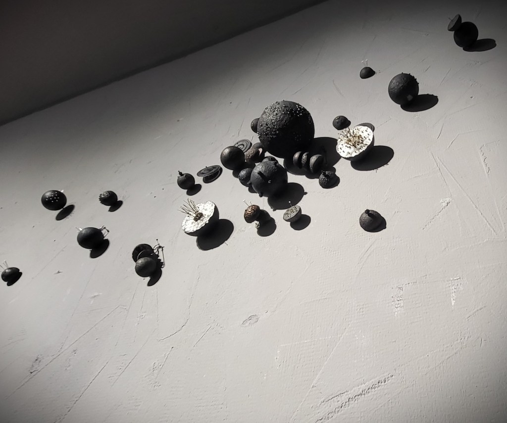 Core Units of Safety Aftermath - wall installation by Roxana Donaldson, mixed media assemblage objects, 2025