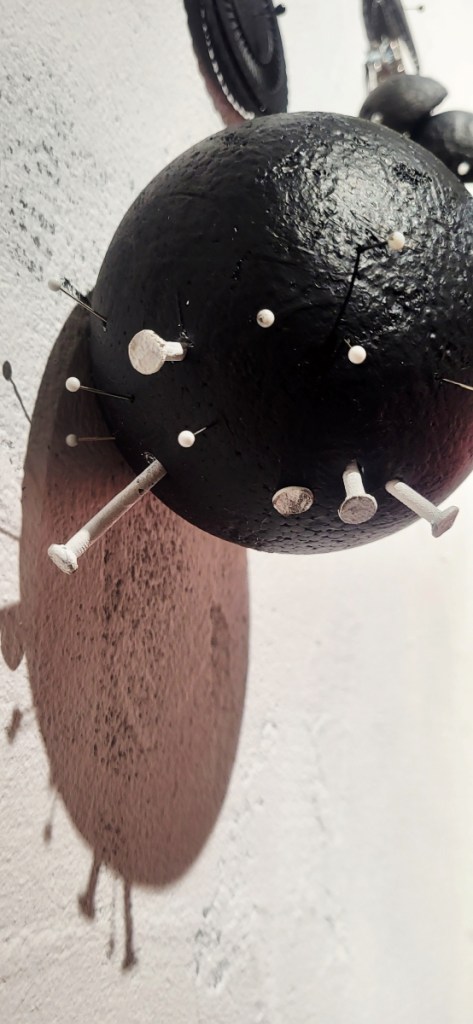 Tactile Extension VII - sphere slice on wall Roxana Donaldson, wall assemblage, 2025